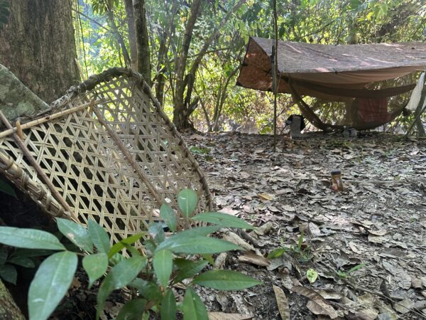 This is a Picture of indigenous craft next to a hammock in Guyana, South America Taken by The Wildtales Inc.