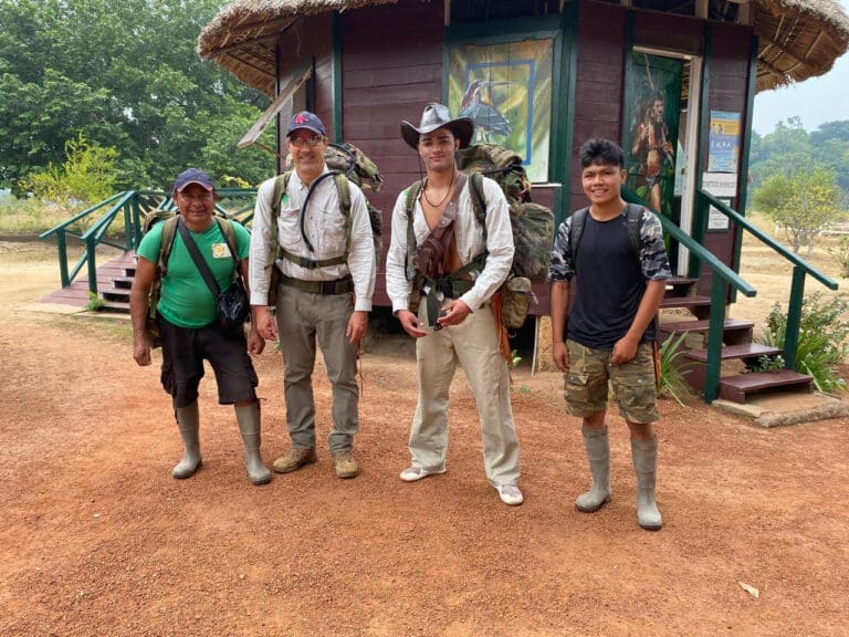 Indigenous guides in longboots